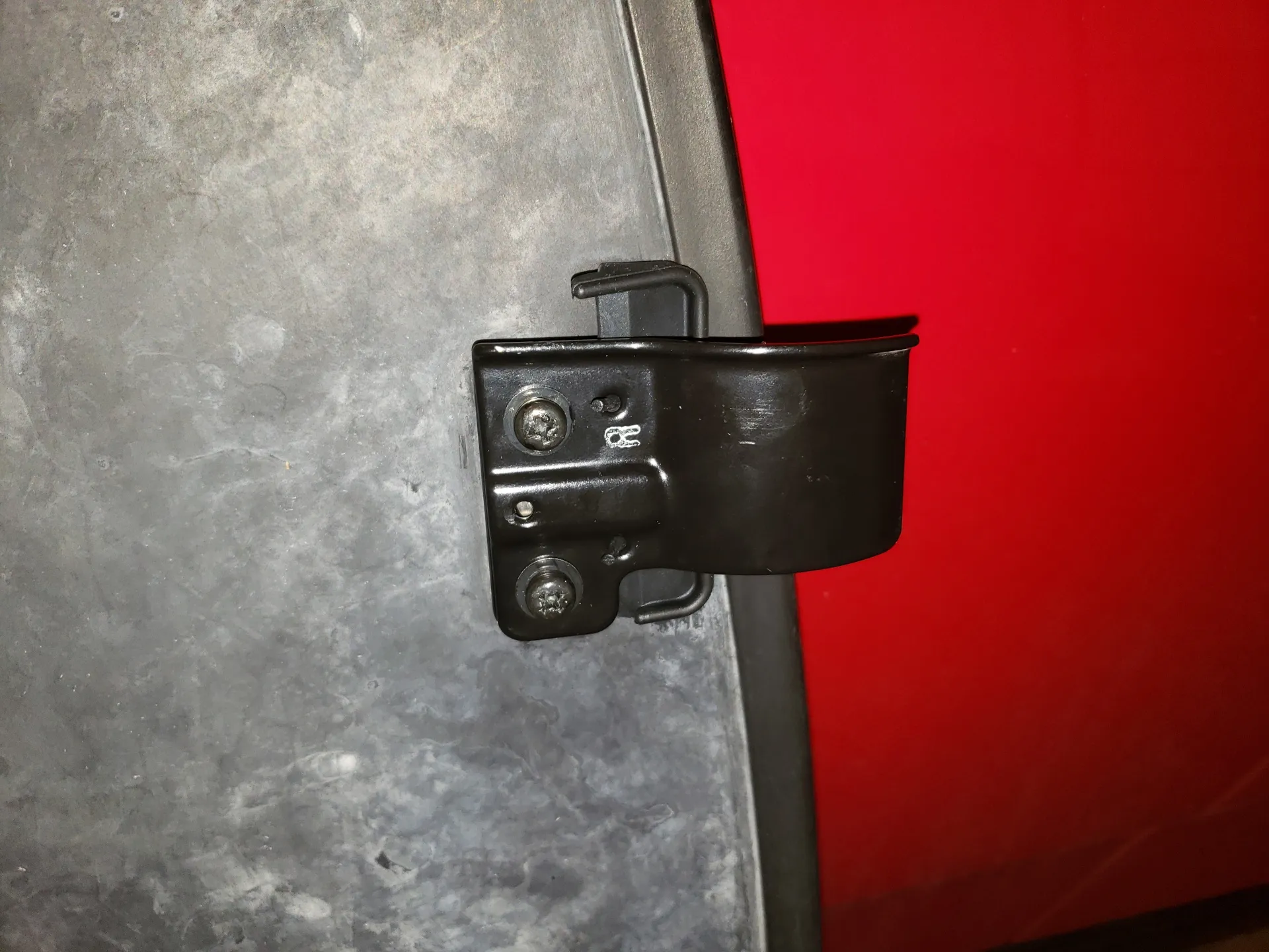 This is an example of the sunroof clip on the passenger side of the sunroof