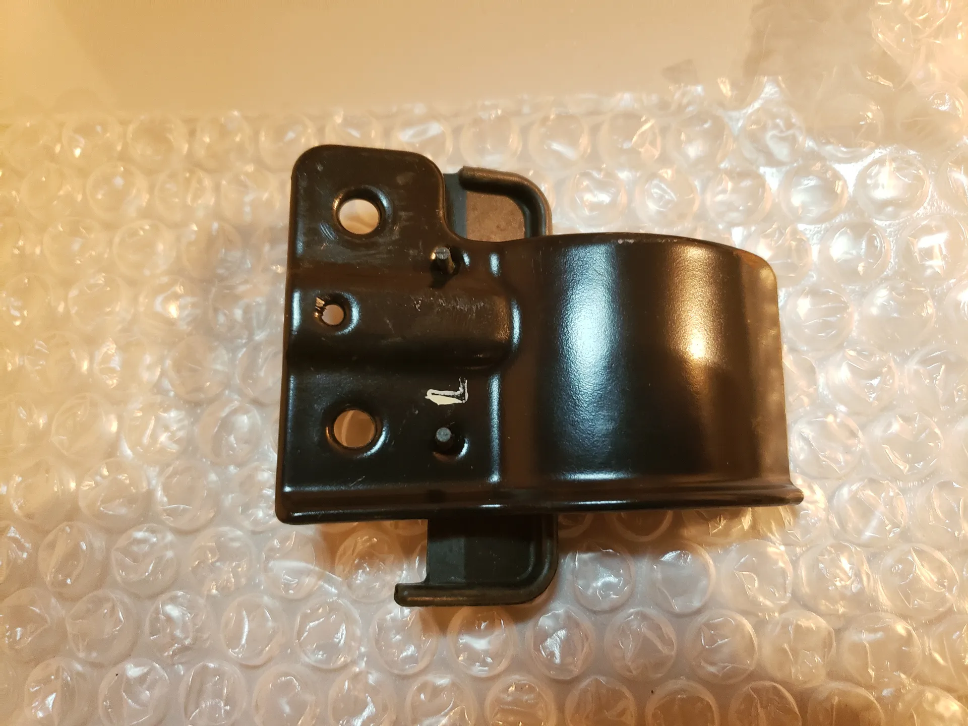 Metal clip with rubber insert
