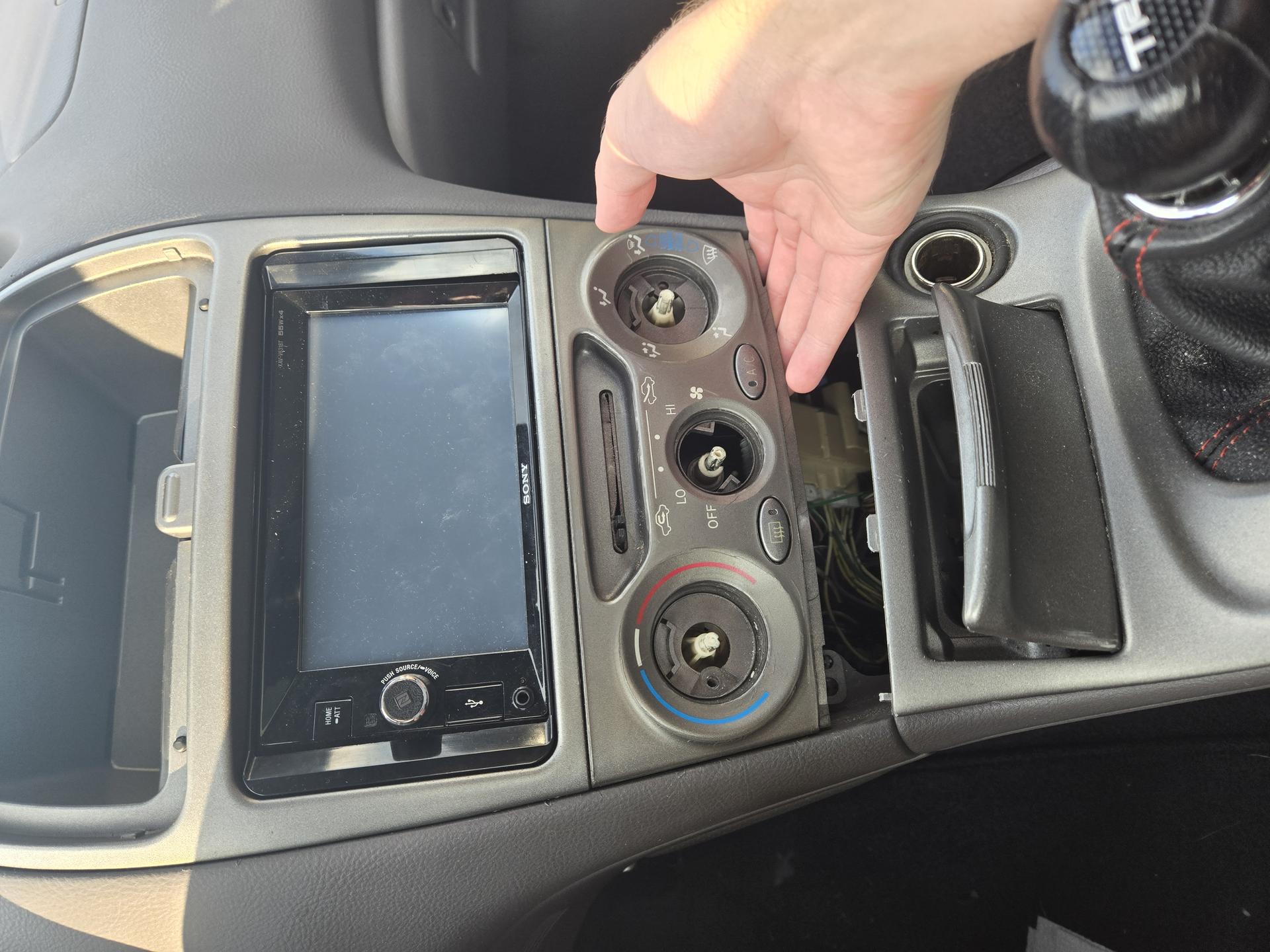 Lift point to remove center console