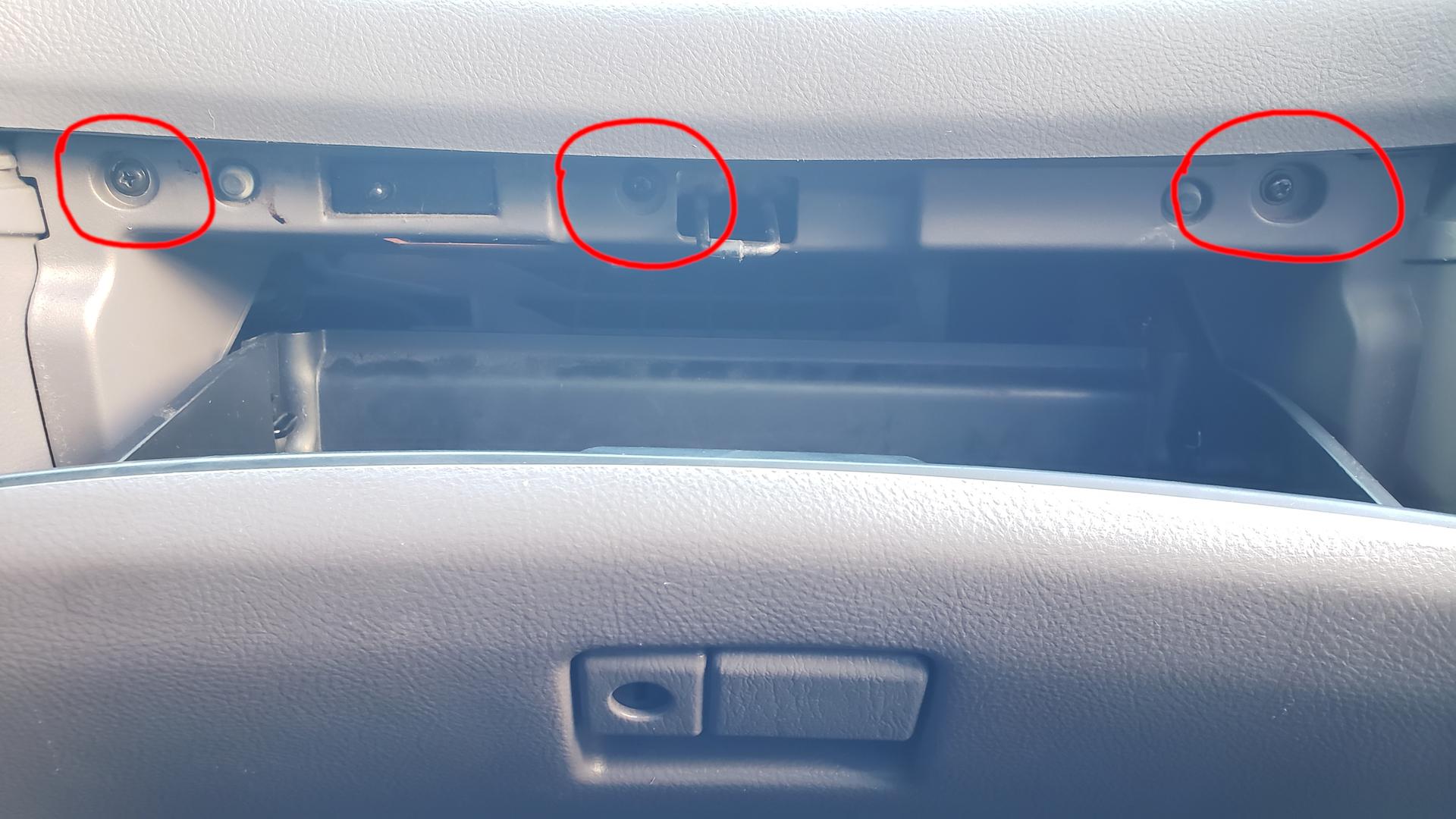 Top glove box mounting screws